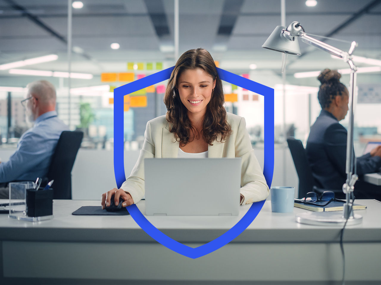 Woman working in a secure environment with her colleagues